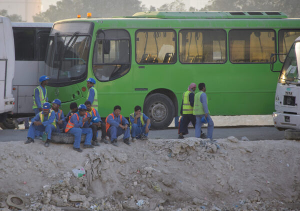 Migrant workers at a construction site in Doha, Qatar, 2018